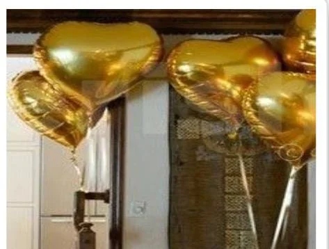Add Golden Heart Foil Balloon